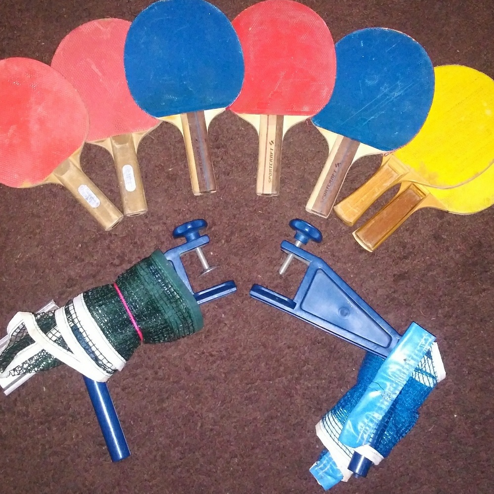 Vintage table tennis paddles and net